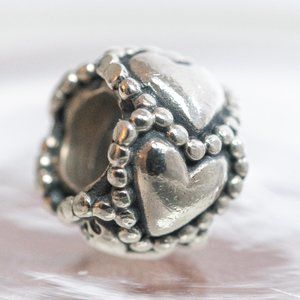 Genuine retired Pandora hearts charm
